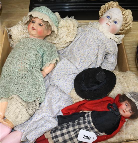 A German bisque-headed doll, no. 966 and two other dolls,